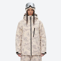 
                  
                    Breathable 3-layer ski jacket and suspender pants set - cream tan marble print, for resort and backcountry days
                  
                