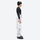 Unisex printed snowboard jacket and bibs - white marble print bib pants, on-model side view, for resort and backcountry days