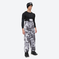 
                  
                    Breathable 3-layer ski jacket and suspender pants set - gray camo marble print bib pants, for cold-weather winter sports
                  
                