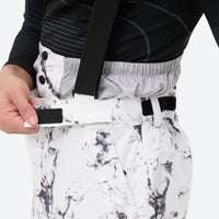 
                  
                    Unisex printed snowboard jacket and bibs - white marble print bib pants, for cold-weather winter sports
                  
                