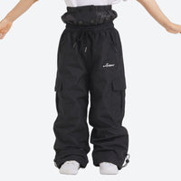 
                  
                    Kids snowboard jacket and pants with snow gaiters - black kids snow pants, for family resort trips
                  
                