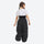 Kids breathable 2-layer ski suit - black kids snow pants with white tee, on-model back view, for family resort trips