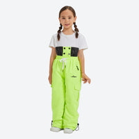 
                  
                    Kids snowboard jacket and pants with snow gaiters - neon green kids snow pants with white tee, on-model front view
                  
                