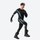 Men's compression suit for snow sports and training - black teal compression base layer suit on men, skiing pose with goggles