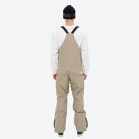 
                  
                    Men's breathable 3-layer suspender ski pants - tan bib snow pants with white top, for resort and backcountry days
                  
                