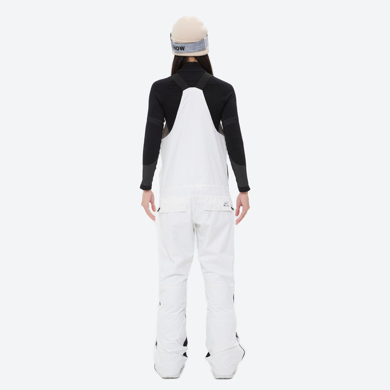 Women's bib snowboard pants with snow gaiters - white bib snow pants with black top, for cold-weather winter sports