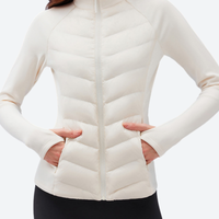 
                  
                    Women's warm packable down midlayer with stretch fabric - white down jacket on women, for travel and daily commute
                  
                