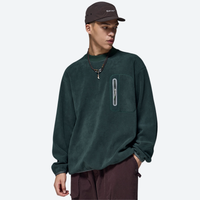 
                  
                    Women's warm brushed fleece top for outdoor - dark green crewneck fleece sweatshirt on men with cap
                  
                