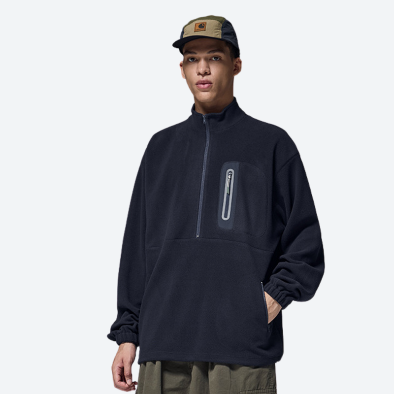 Women's warm brushed fleece top for outdoor - navy half-zip fleece sweatshirt on men with cap, front standing view