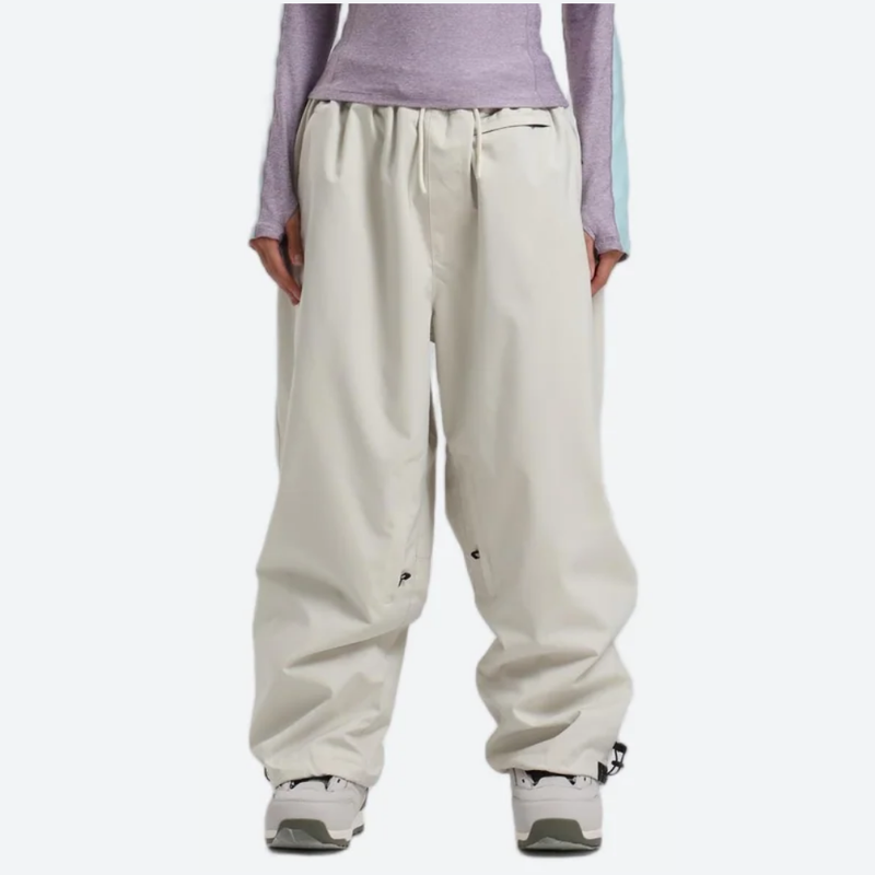 Women's waterproof 2L snow jacket and pants - cream snow pants, on-model front view, for resort and street wear