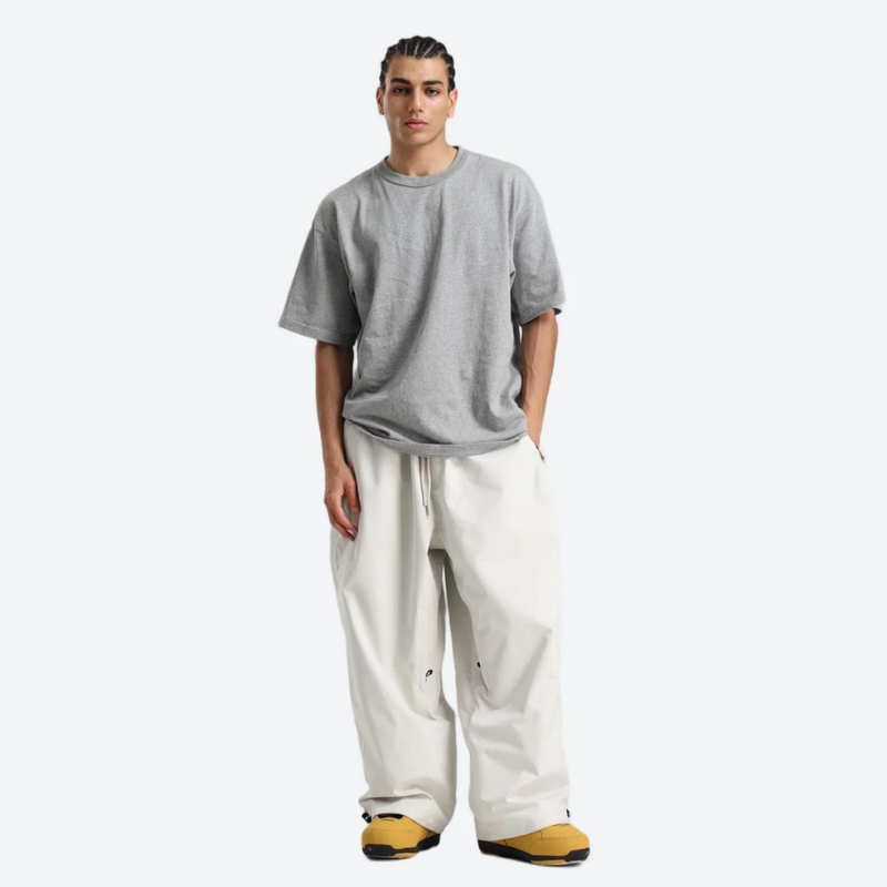 Breathable 3-layer ski pullover with balloon pants - white snow pants with gray tee, for cold-weather winter sports