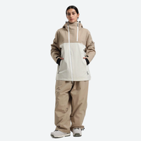 
                  
                    Women's breathable 2-layer snowboard jacket and pants - tan and cream colorblock jacket with tan pants
                  
                