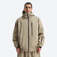 
                  
                    Unisex snowboard jacket and pants set - tan jacket, on-model front view, for powder days and winter commute
                  
                
