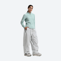 
                  
                    Women's waterproof 2L snow jacket and pants - mint base layer top with white snow pants, for resort and street wear
                  
                
