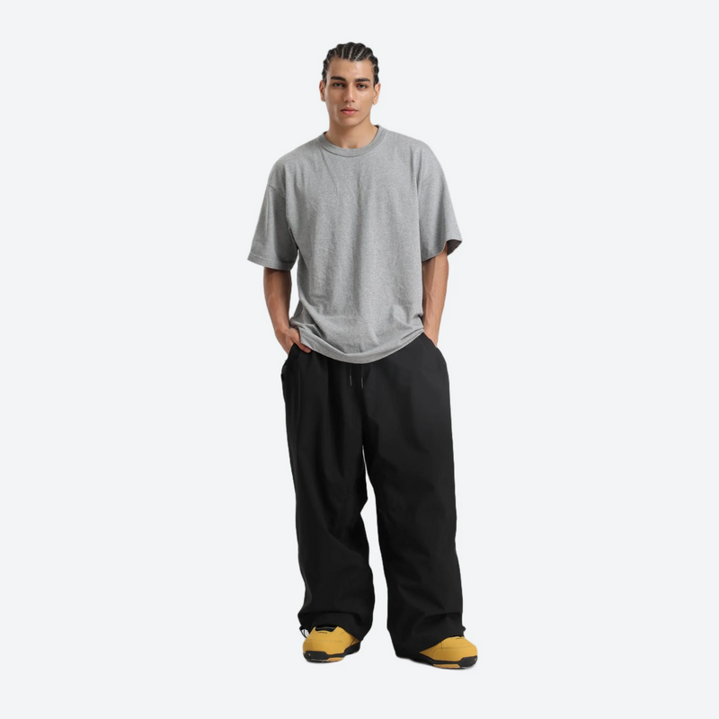 Men's breathable ski jacket with chest zip pockets - black snow pants with gray tee, for resort and street wear