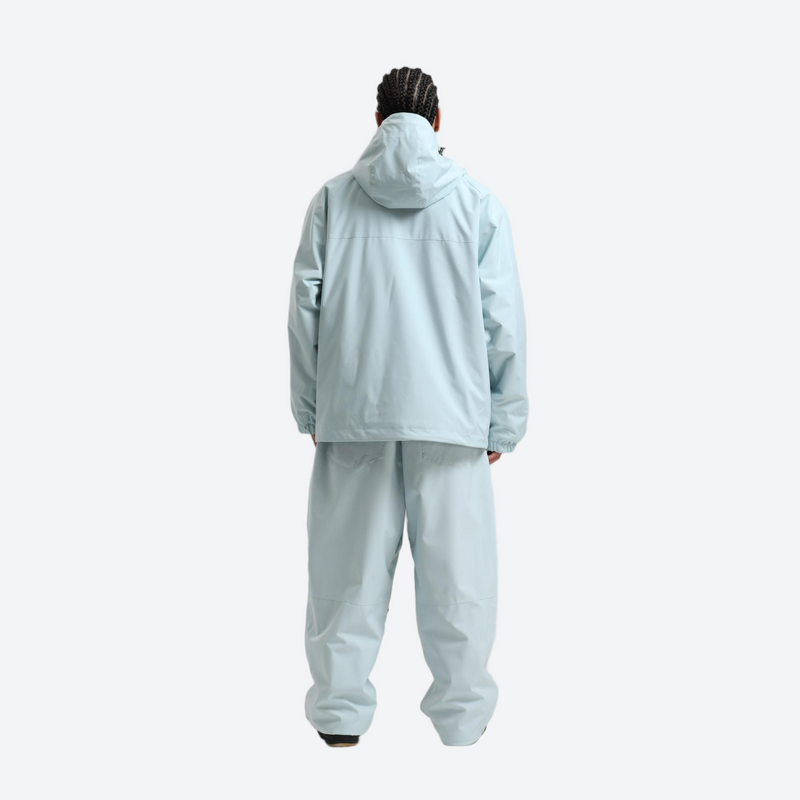 Men's breathable ski pullover set - ice blue jacket with ice blue pants, on-model back hood view, for resort and street wear