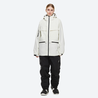 
                  
                    Women's breathable ski jacket in candy colors - white jacket with black pants, for powder days and winter commute
                  
                
