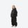 Youth 3-layer ski suit with bib pants - black, kids on-model three-quarter front view, for cold-weather winter outdoor fun
