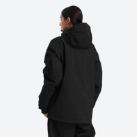 
                  
                    Women's breathable 2-layer snowboard jacket and pants - black, on-model back hood view, for powder days and winter commute
                  
                