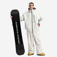 
                  
                    Unisex snowboard jacket and pants set - white jacket with white pants, for powder days and winter commute
                  
                