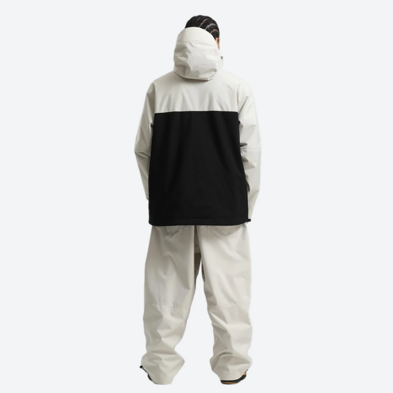 Men's colorblock ski anorak set - cream and black colorblock, on-model back hood view, knee vents dump heat