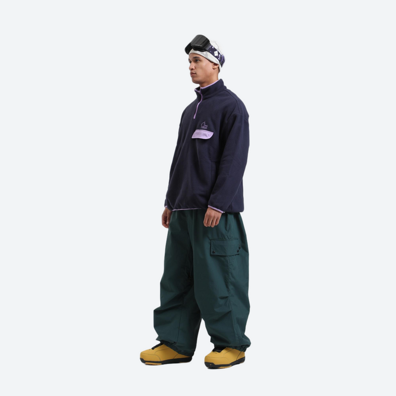 3-layer snowboard cargo pants - dark green snow pants, on-model side view, for powder days and winter commute