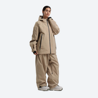 
                  
                    Women's waterproof 2L snow jacket and pants - tan jacket with tan pants, for powder days and winter commute
                  
                