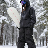 
                  
                    Women's 3-layer snowboard jacket and pants - black jacket with black pants, for powder and piste riding
                  
                