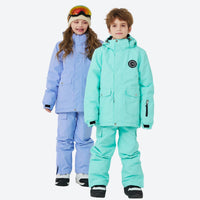 
                  
                    Kids breathable 2-layer colorblock ski suit - periwinkle kids jacket with periwinkle pants, for cold-weather winter sports
                  
                