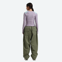 
                  
                    Women's 2-layer snowboard jacket and pants - olive green snow pants with lavender top, for resort and street wear
                  
                