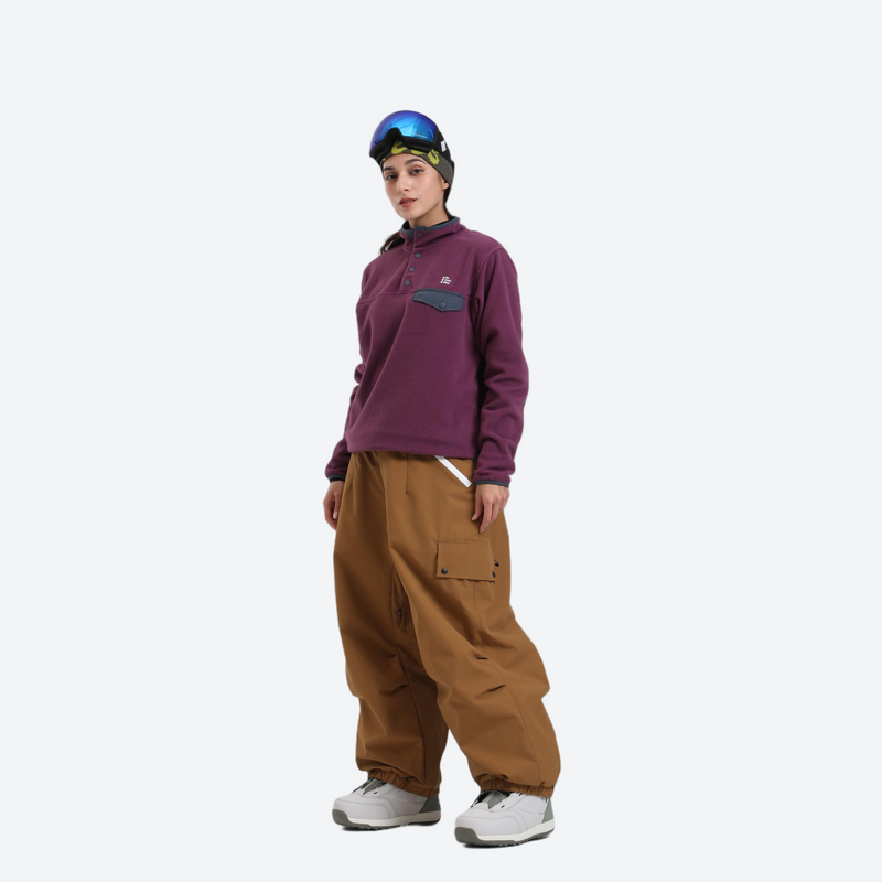 Waterproof 3L cargo snow pants - tan snow pants with purple pullover, for powder days and winter commute