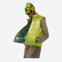 
                  
                    Unisex ultralight packable down vest and jacket - lime green ultralight down vest on men with patterned beanie
                  
                