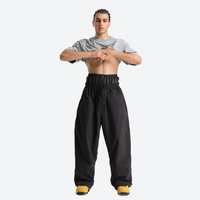 
                  
                    Breathable 3-layer ski pullover with balloon pants - black snow pants, for cold-weather winter sports
                  
                