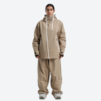 
                  
                    Women's breathable 2-layer snowboard jacket and pants - tan jacket with tan pants, for cold-weather winter sports
                  
                