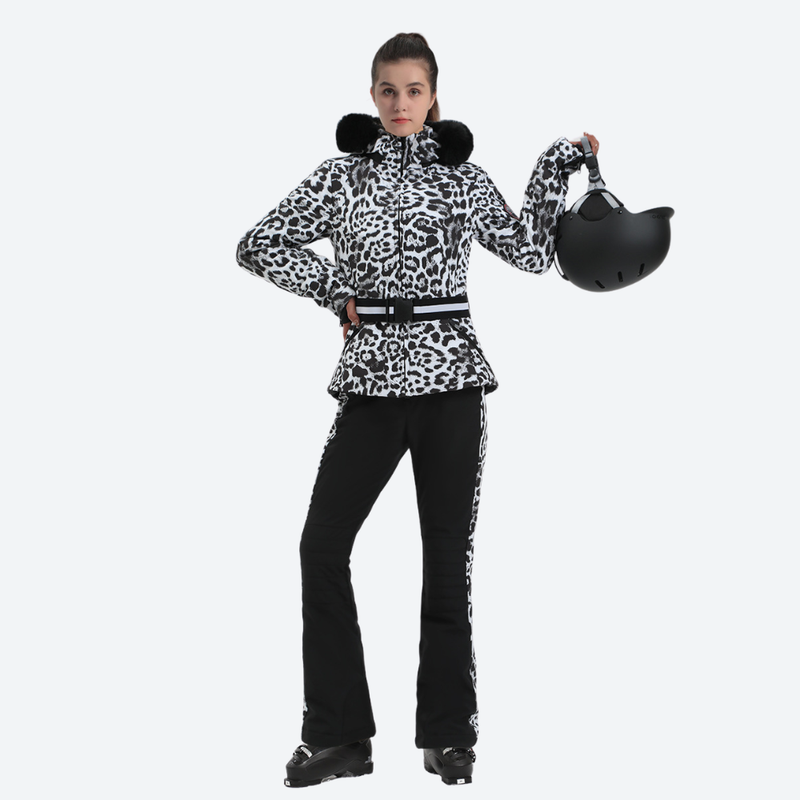 Women's slim ski jacket with belt and fur hood - leopard print slim fit ski jacket with fur collar, front view holding helmet