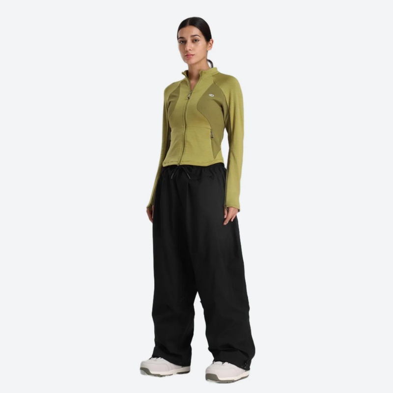 Women's breathable ski jacket with chest zip pockets - black snow pants with olive top, for resort and street wear