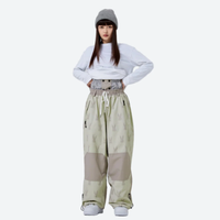 
                  
                    Women's waterproof 2L snow jacket and pants - sage green rabbit print snow pants with white top
                  
                