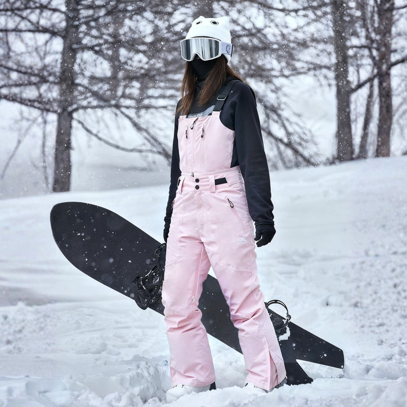 Unisex snowboard bib pants with snow gaiters - pink bib pants with black top, for resort and backcountry days