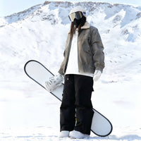 
                  
                    Unisex waterproof 3L snow jacket and pants series - tan jacket with black pants, for resort and street wear
                  
                