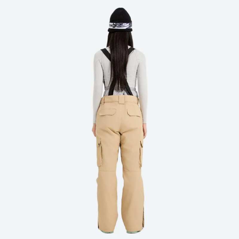 Women's waterproof 2L ski jacket and bib pants - tan snow pants, on-model back view, for cold-weather winter sports