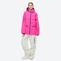 
                  
                    Women's waterproof 2L snow jacket and pants - pink jacket with white pants, for cold-weather winter sports
                  
                