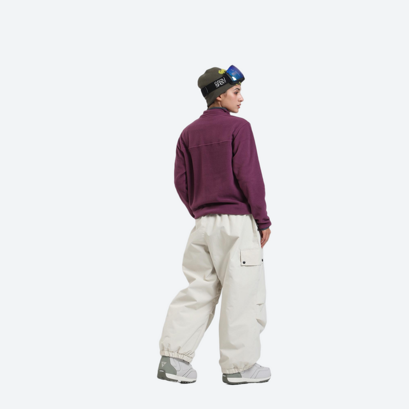 3-layer snowboard cargo pants - cream snow pants with purple pullover, on-model back view, for resort and street wear