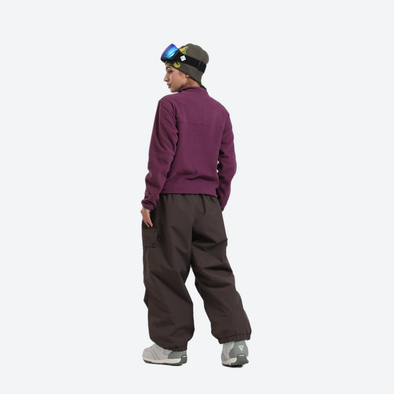 3-layer snowboard cargo pants - coffee brown snow pants with purple pullover, on-model side view, for resort and street wear