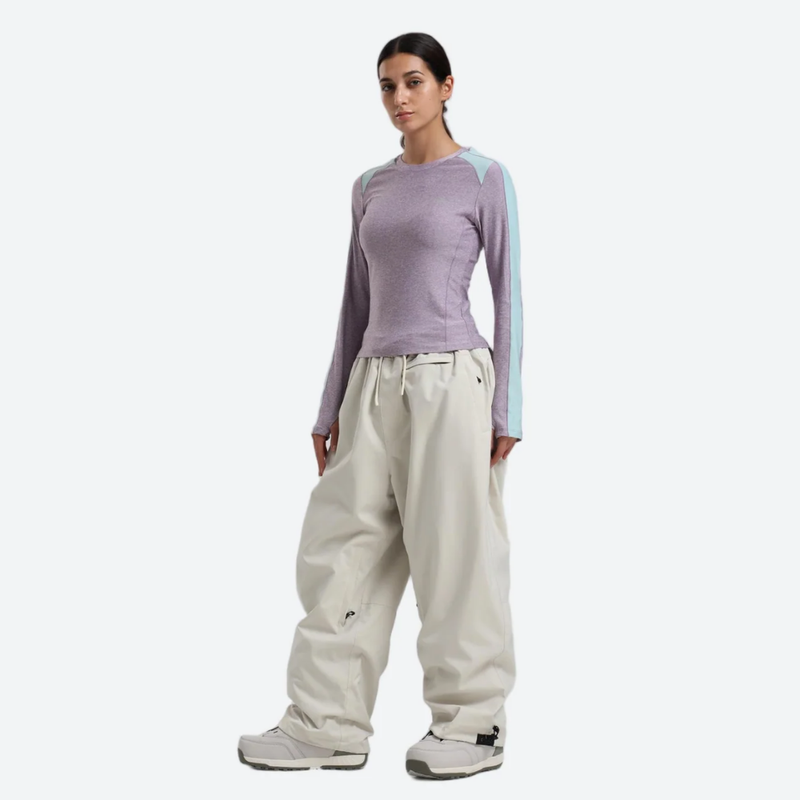 Women's breathable ski jacket with chest zip pockets - white snow pants with lavender top, for resort and street wear