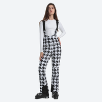 
                  
                    Women's slim fit waterproof ski bib pants - houndstooth slim fit ski bib, front standing view, for winter mountain trips
                  
                