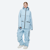
                  
                    Women's breathable ski jacket in candy colors - ice blue jacket with ice blue pants, for skiing and snowboarding
                  
                