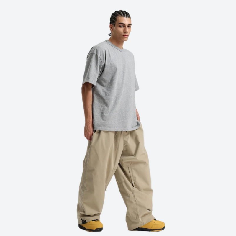 Breathable 3-layer ski pullover with balloon pants - tan snow pants with gray tee, for cold-weather winter sports