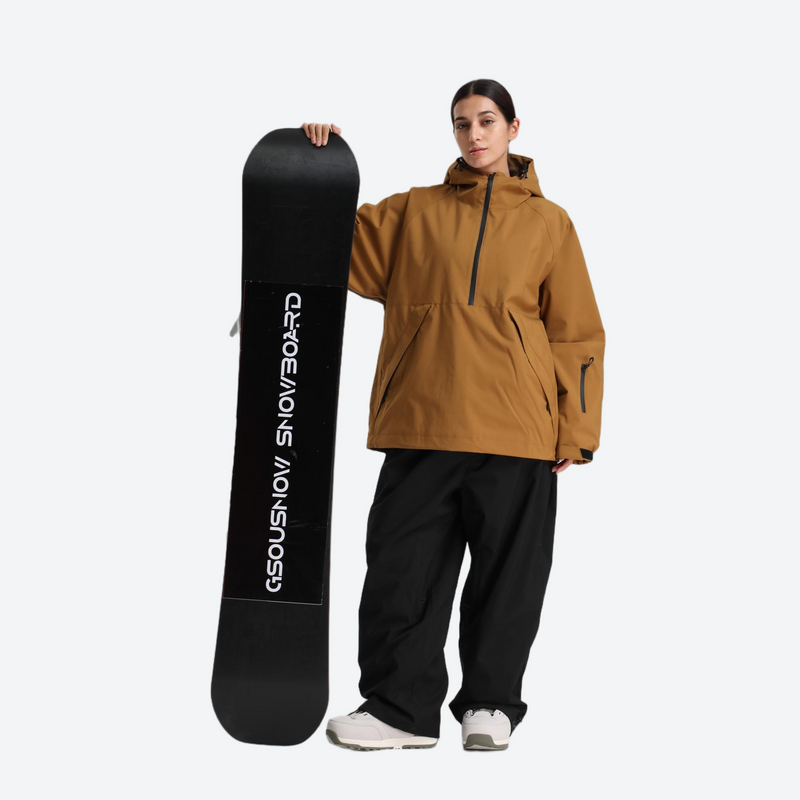 Women's 2-layer snowboard jacket and pants - caramel tan anorak jacket with black pants, for cold-weather winter sports