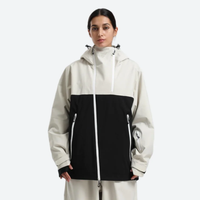 
                  
                    Women's colorblock ski jacket set - cream and black colorblock, on-model front view, for resort and street wear
                  
                