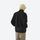Breathable honeycomb knit fleece jacket with full zip - black honeycomb fleece jacket on men with hood up, back standing view